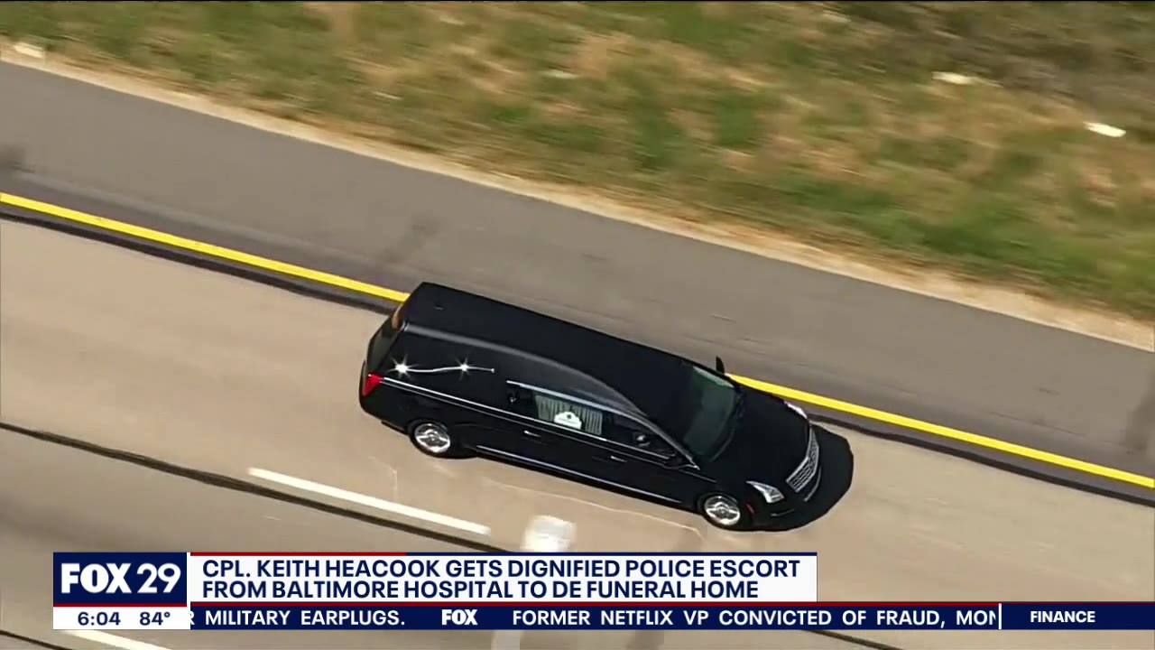Police escort returns body of slain officer to Delaware